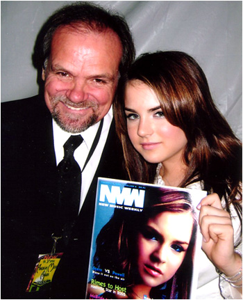 Larry with recording artist JoJo and her cover on New Music Weekly. 